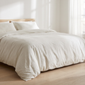Lit de 180 habillé d'une housse de couette 240x260 en percale de coton lavé blanc cassé