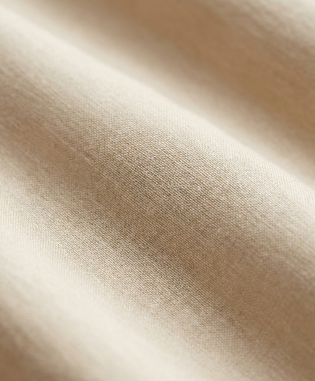 Gros plan macro sur le coton égyptien longues fibres Noctua Paris, tissage serré