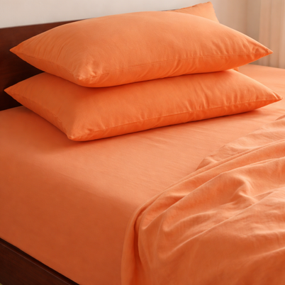 Drap-housse en coton doux Noctua Paris tendu sur un matelas