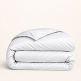 Housse de couette en Lyocell blanc, pliage généreux sur fond ivoire