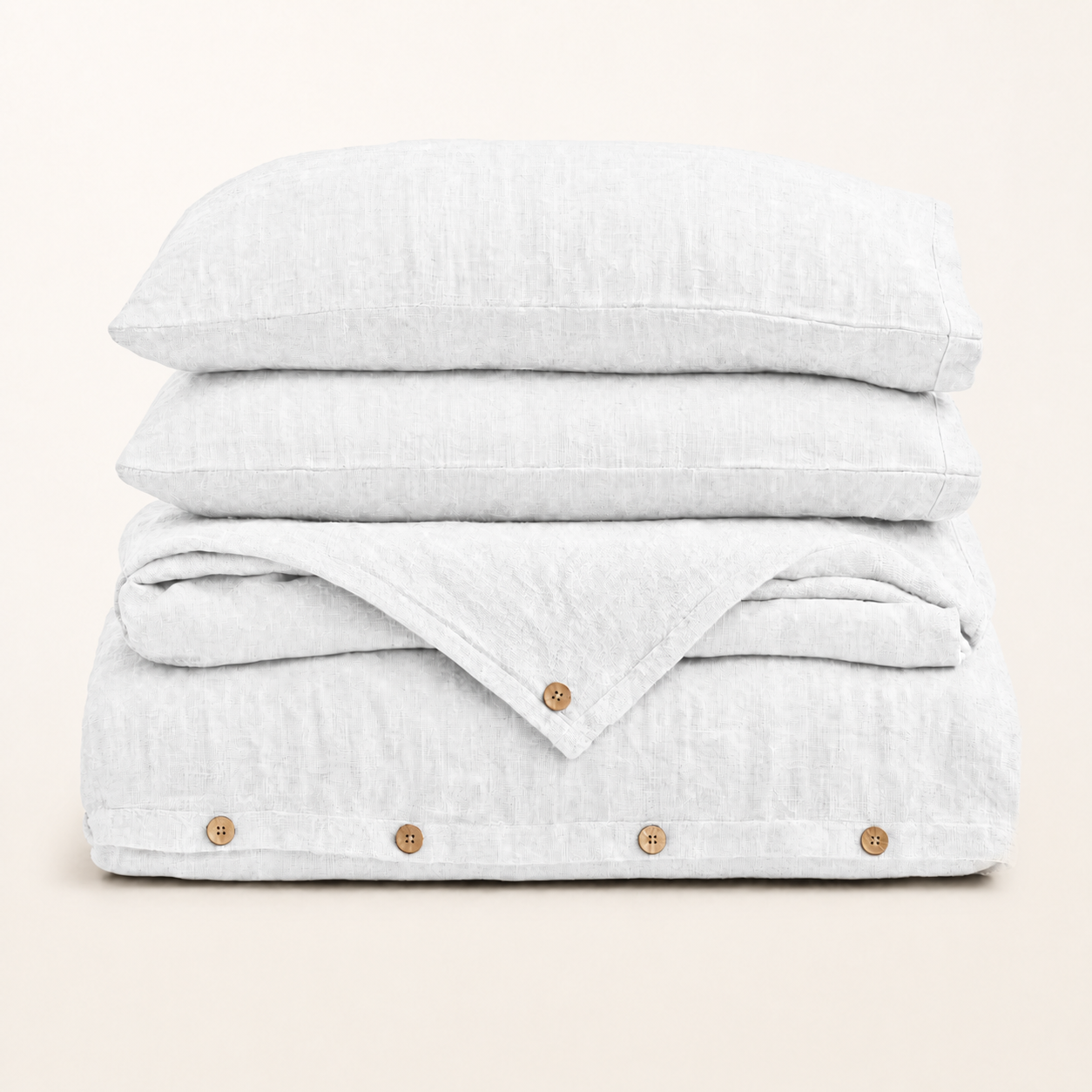 Parure de lit en lin lavé blanc, packshot sur fond blanc chaud, Noctua Paris
